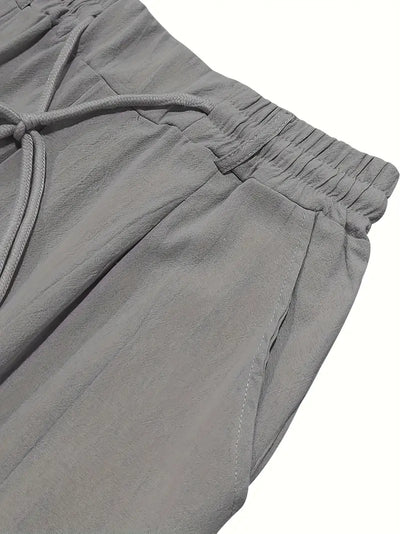 NICHOLS | PANTALONI LARGHI IN LINO CON COULISSE